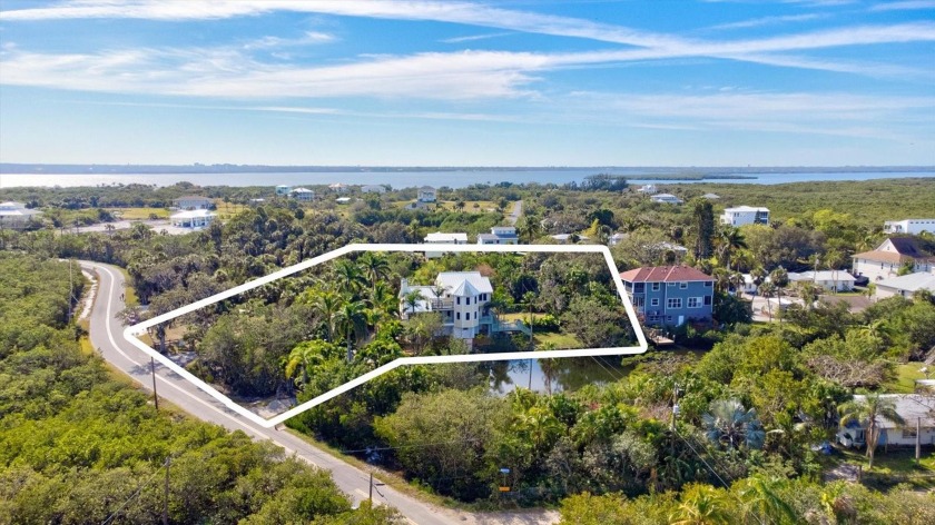 COMPLETE PRIVACY WITH AN ADDITIONAL BUILDABLE PARCEL that offers - Beach Home for sale in Terra Ceia, Florida on Beachhouse.com