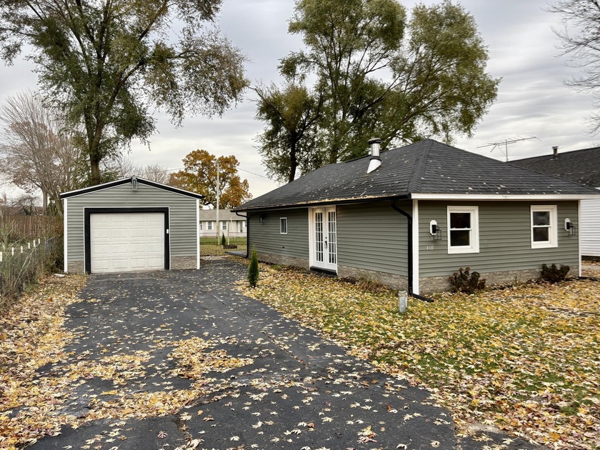 Fresh, modern, and move-in ready - this updated 3-bedroom - Beach Home for sale in Muskegon, Michigan on Beachhouse.com