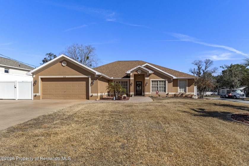 Stunning Custom Designed & Built 4/2/2+ Pool Home on a corner - Beach Home for sale in Spring Hill, Florida on Beachhouse.com