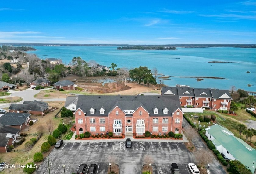 Experience coastal living at its finest in this poolside - Beach Condo for sale in Swansboro, North Carolina on Beachhouse.com