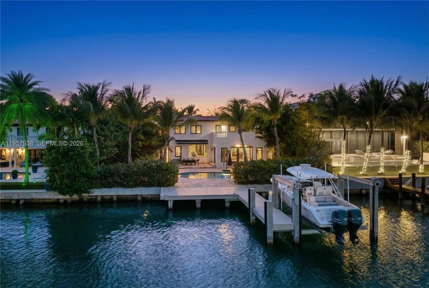 Escape to the pinnacle of privacy in this guard-gated Miami - Beach Home for sale in Miami Beach, Florida on Beachhouse.com