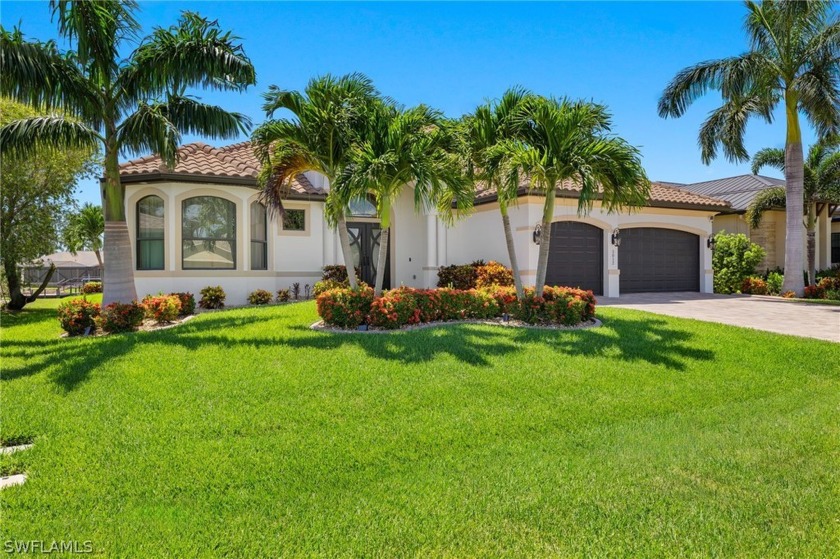 BREATHTAKING SUNSET VIEWS FROM YOUR LANAI OVER THE EXPANSIVE - Beach Home for sale in Cape Coral, Florida on Beachhouse.com