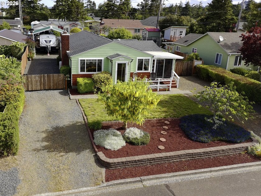 Enjoy the convenience of in-town living with the space and - Beach Home for sale in Florence, Oregon on Beachhouse.com