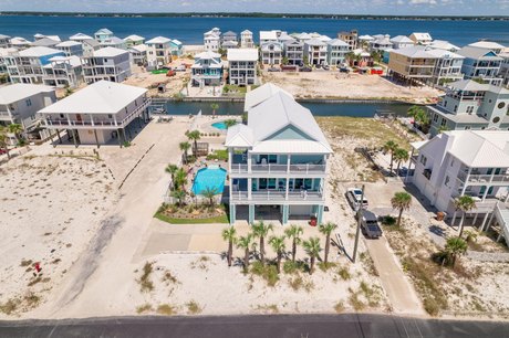 Beautiful Gulf views * 4 BR/ 3.5 BA * Pool * Canal access with - Beach Home for sale in Navarre, Florida on Beachhouse.com