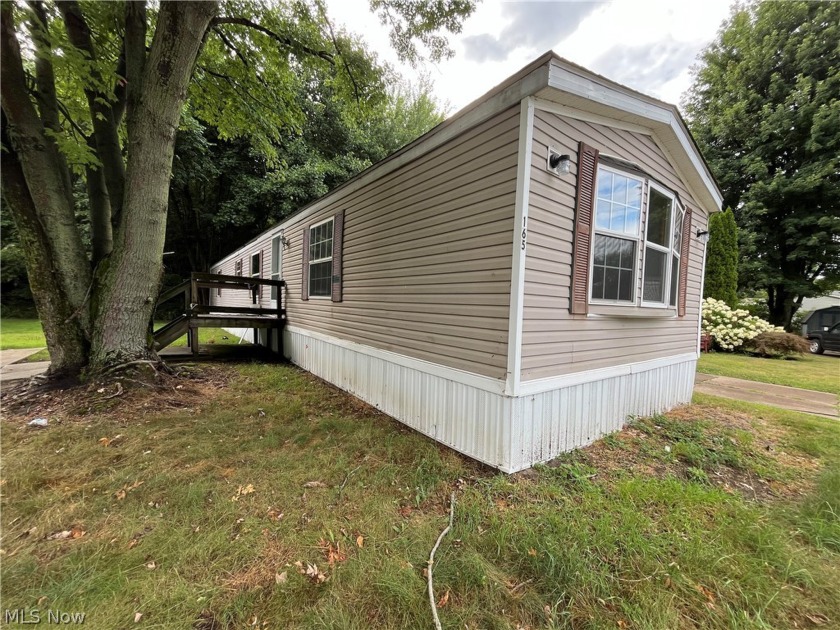 Welcome to this convenient, comfortable home in the rear of the - Beach Home for sale in Madison, Ohio on Beachhouse.com