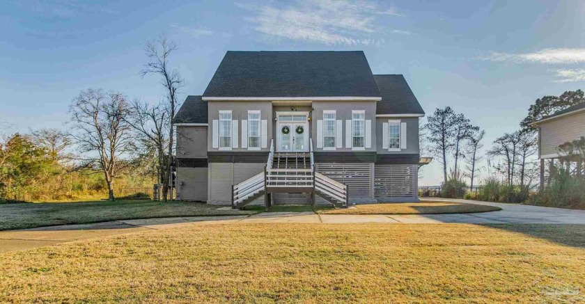 Welcome to your dream home on the water! With almost 100 ft of - Beach Home for sale in Pace, Florida on Beachhouse.com