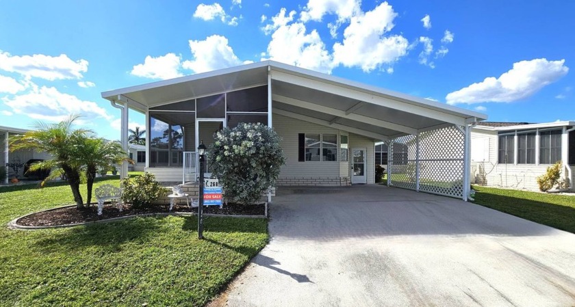 Welcome to your dream home in the beautiful Golf Course - Beach Home for sale in Punta Gorda, Florida on Beachhouse.com