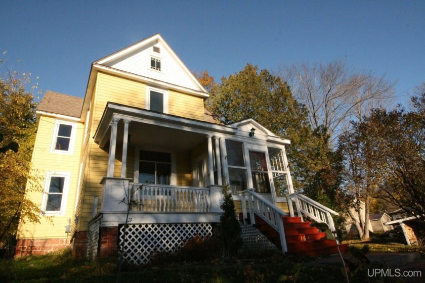 This charming 125 year old home is on a spacious corner lot, on - Beach Home for sale in Lake Linden, Michigan on Beachhouse.com