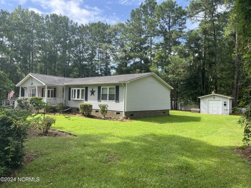 Nestled 0n a large lot, in an established neighborhood, a 3/2 - Beach Home for sale in Calabash, North Carolina on Beachhouse.com