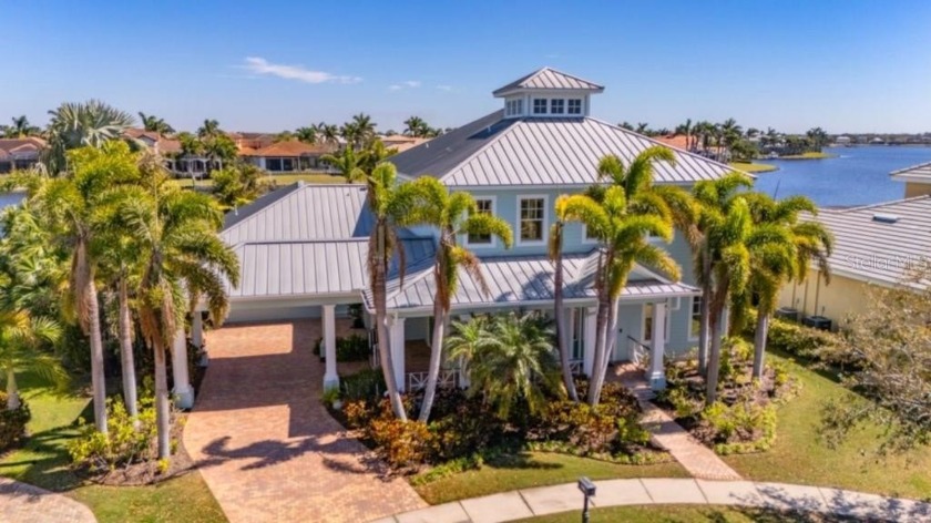 PANORAMIC VIEWS / WATERFRONT + DOCK / BUILDER MODEL HOME / POOL - Beach Home for sale in Apollo Beach, Florida on Beachhouse.com