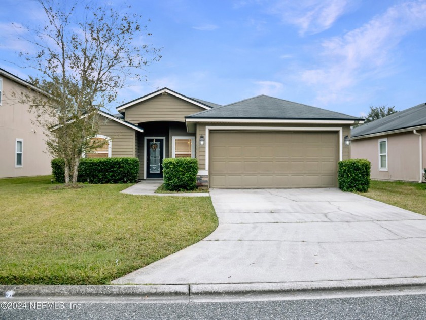 This charming home offers peaceful pond views right from your - Beach Home for sale in Saint Johns, Florida on Beachhouse.com