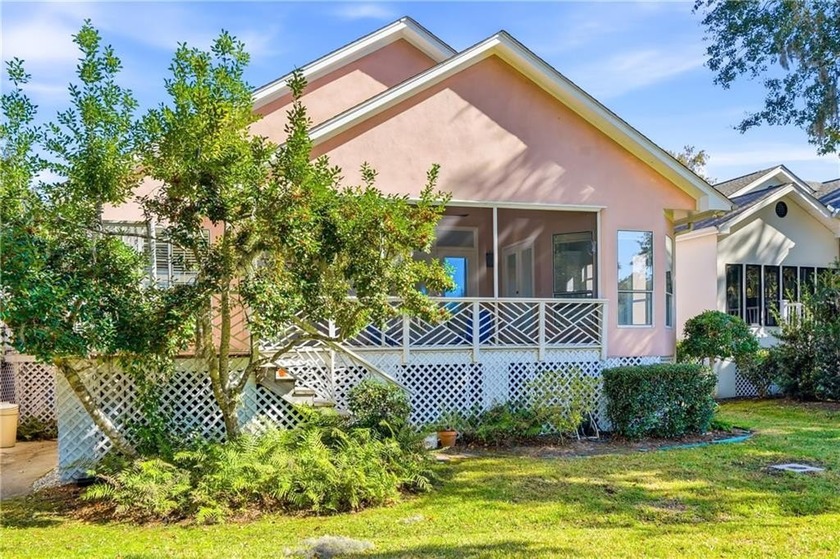This spectacular home is tucked within the highly sought-after - Beach Home for sale in Saint Simons, Georgia on Beachhouse.com
