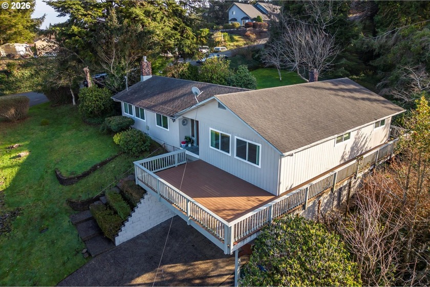 Views! Views! Views! This lovely home is situated to give the - Beach Home for sale in Coos Bay, Oregon on Beachhouse.com