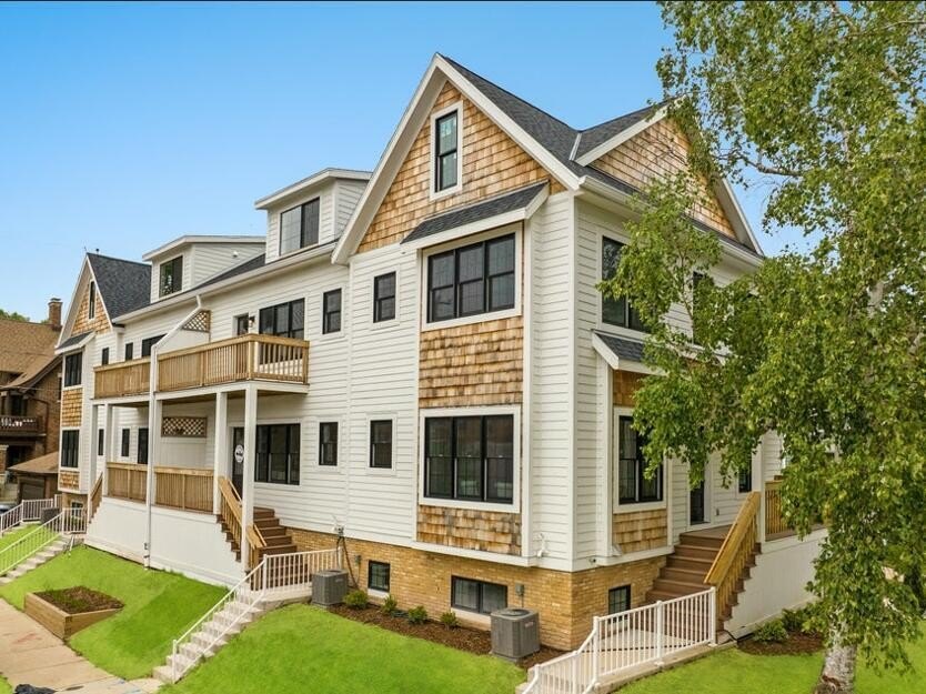 Welcome home to this stunning townhome set on the corner of Park - Beach Condo for sale in Milwaukee, Wisconsin on Beachhouse.com