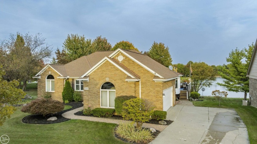 Welcome to this beautiful waterfront ranch, perfectly situated - Beach Home for sale in Shelby, Michigan on Beachhouse.com