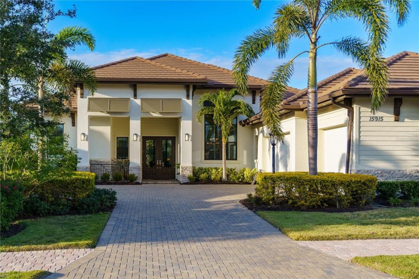 Paradise found in this exquisite maintenance-free custom pool - Beach Home for sale in Lakewood Ranch, Florida on Beachhouse.com
