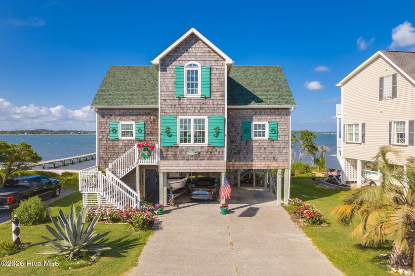 Custom-built coastal waterfront home on Harkers Island with - Beach Home for sale in Harkers Island, North Carolina on Beachhouse.com