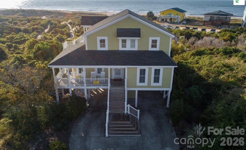 DUNESCAPE OCEANFRONT HOME! A coveted gated community with - Beach Home for sale in Holden Beach, North Carolina on Beachhouse.com