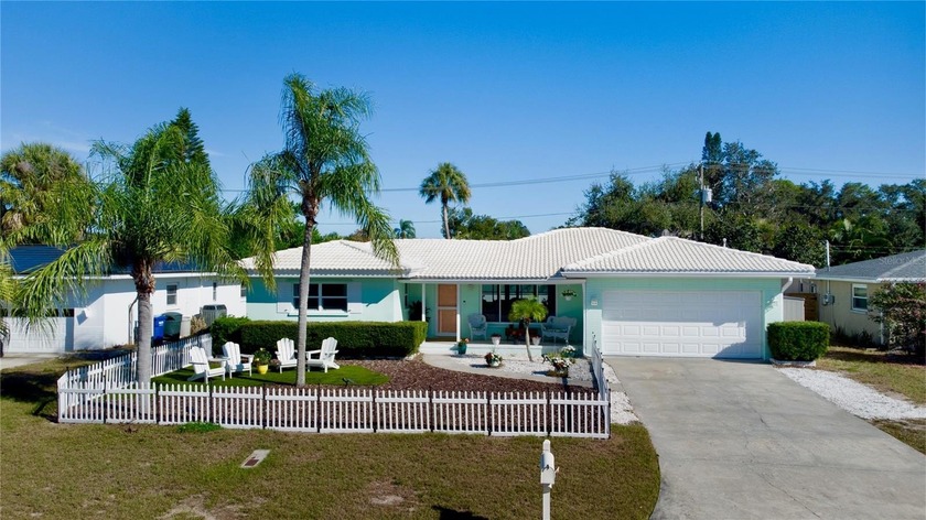 Under contract-accepting backup offers. Just WOW! Tucked back on - Beach Home for sale in Dunedin, Florida on Beachhouse.com