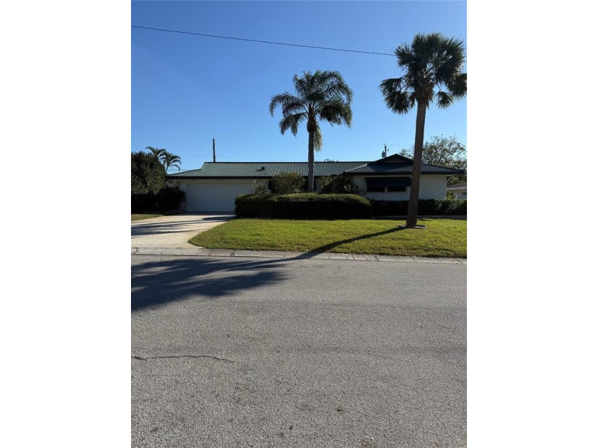 Presenting a beautifully remodeled, open-concept 3-bedroom - Beach Home for sale in Clearwater, Florida on Beachhouse.com