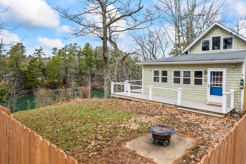 Tucked along the shores of Buttermilk Cove, this beautifully - Beach Home for sale in Brunswick, Maine on Beachhouse.com