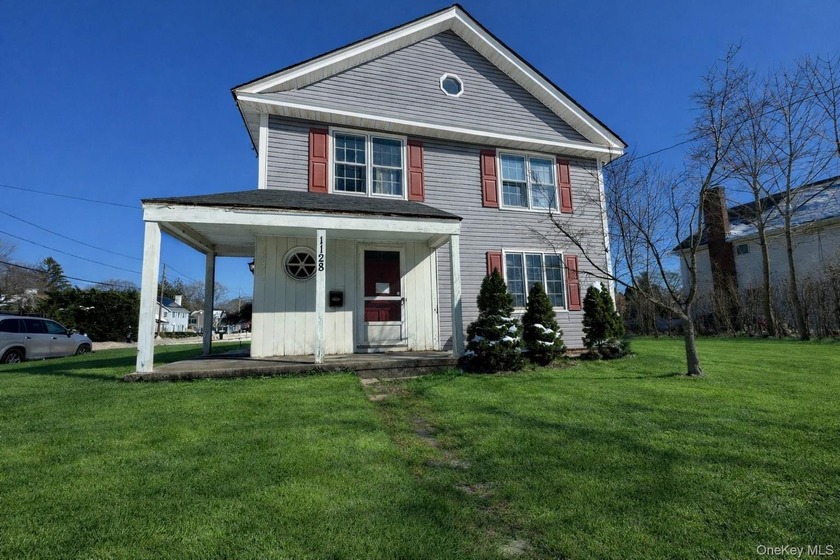 Welcome To 1128 Roanoke Avenue. This Classic 3-Bedroom, 2.5-Bath - Beach Home for sale in Riverhead, New York on Beachhouse.com
