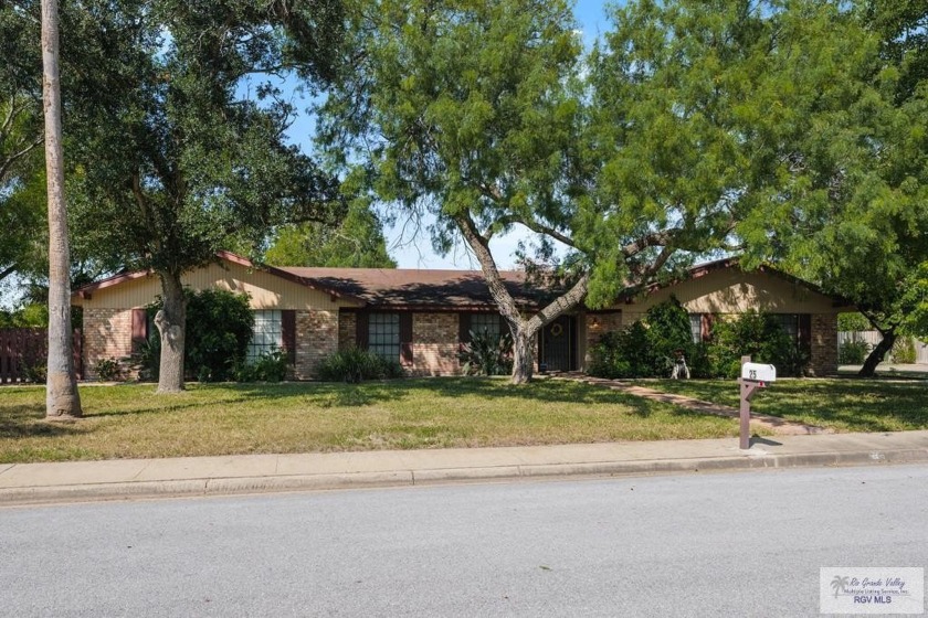 Nestled in the sought-after Land O'Lake subdivision, this - Beach Home for sale in Brownsville, Texas on Beachhouse.com