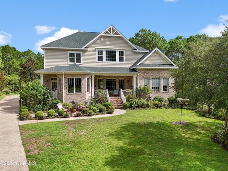 This Barker Canady craftsman-style custom built show home offers - Beach Home for sale in Southport, North Carolina on Beachhouse.com