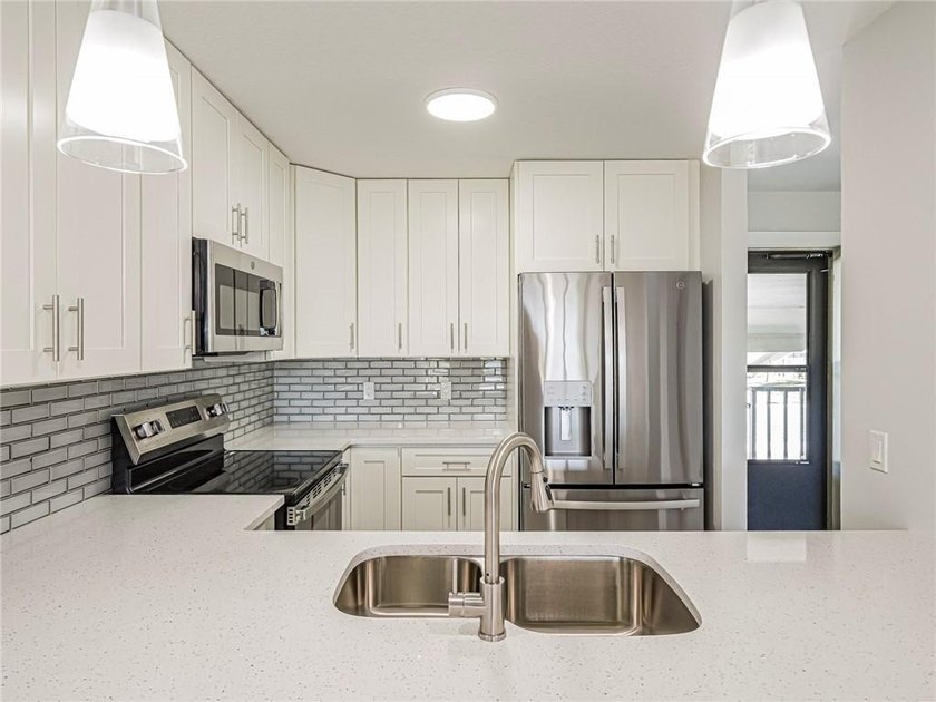 Scenic golf course views, completely remodeled. NEW: ceiling - Beach Condo for sale in Vero Beach, Florida on Beachhouse.com