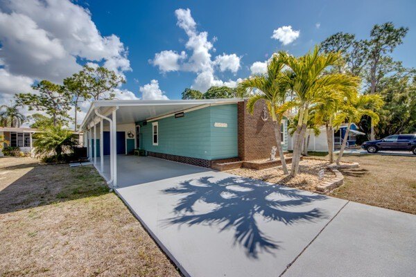 One-of-a-Kind Custom Home in the Golf Community of Lake Fairways - Beach Home for sale in North Fort Myers, Florida on Beachhouse.com