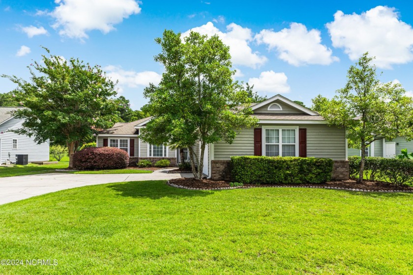 Located in the beautiful golf course community of Brick Landing - Beach Home for sale in Ocean Isle Beach, North Carolina on Beachhouse.com