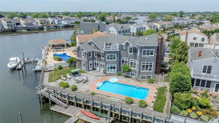 Enjoy summer in this beautiful Hamptons-style home nestled in - Beach Home for sale in Wantagh, New York on Beachhouse.com