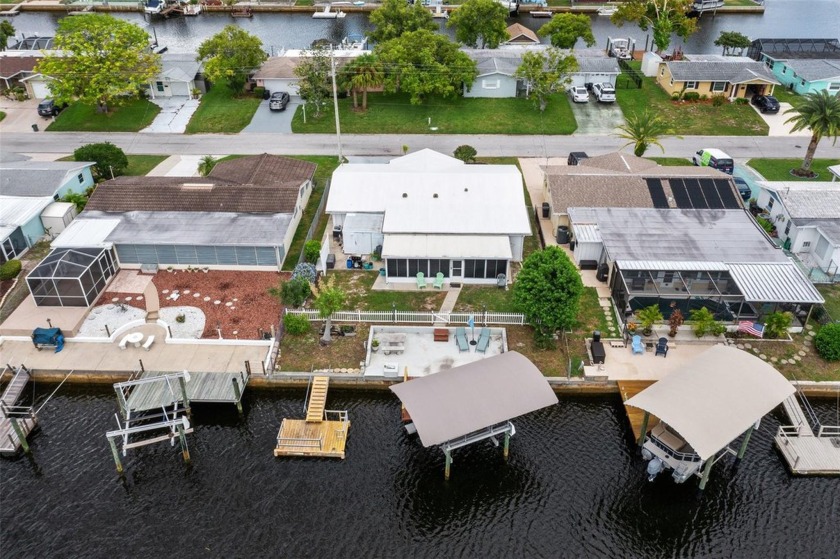 Welcome to waterfront living at its finest with this charming - Beach Home for sale in Hudson, Florida on Beachhouse.com