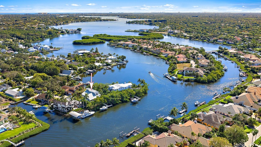 This gorgeous riverfront home boasts 100 feet of water frontage - Beach Home for sale in Jupiter, Florida on Beachhouse.com