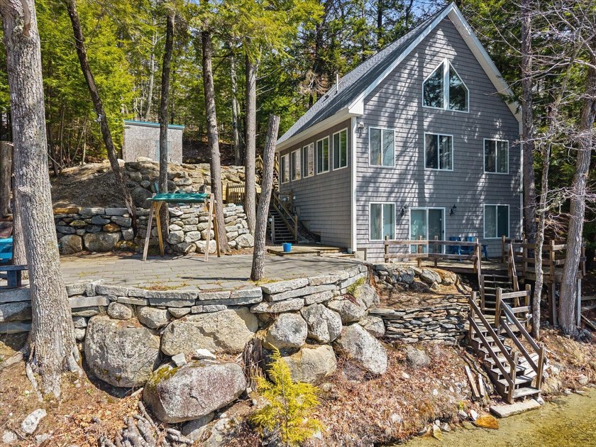 Tucked along the shores of pristine Harts Pond, this year-round - Beach Home for sale in Orland, Maine on Beachhouse.com