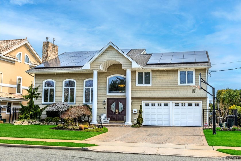Discover luxury waterfront living in this meticulously expanded - Beach Home for sale in Merrick, New York on Beachhouse.com