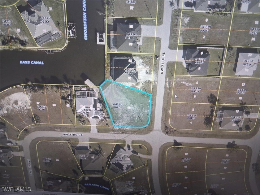 This corner, overside gulf access lot, has a new seawall - Beach Lot for sale in Cape Coral, Florida on Beachhouse.com