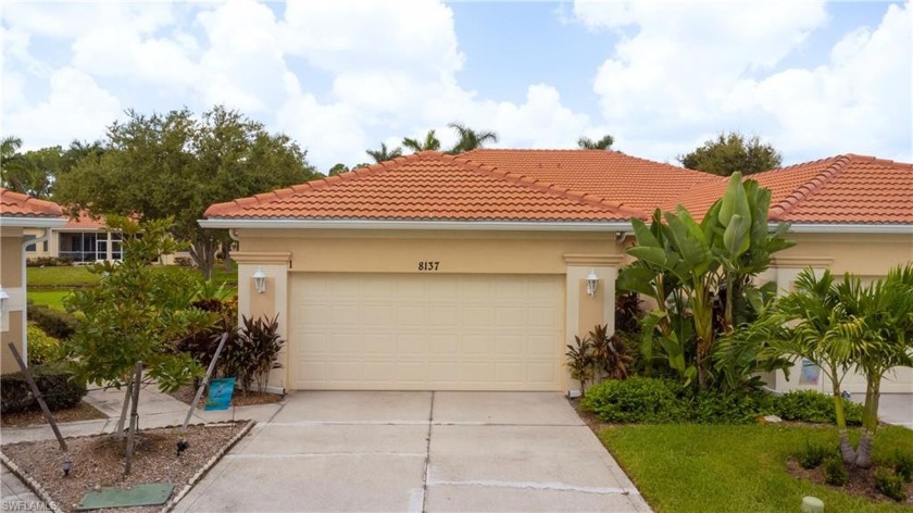Drive into the beautiful tree lined community of The Sanctuary - Beach Home for sale in Naples, Florida on Beachhouse.com