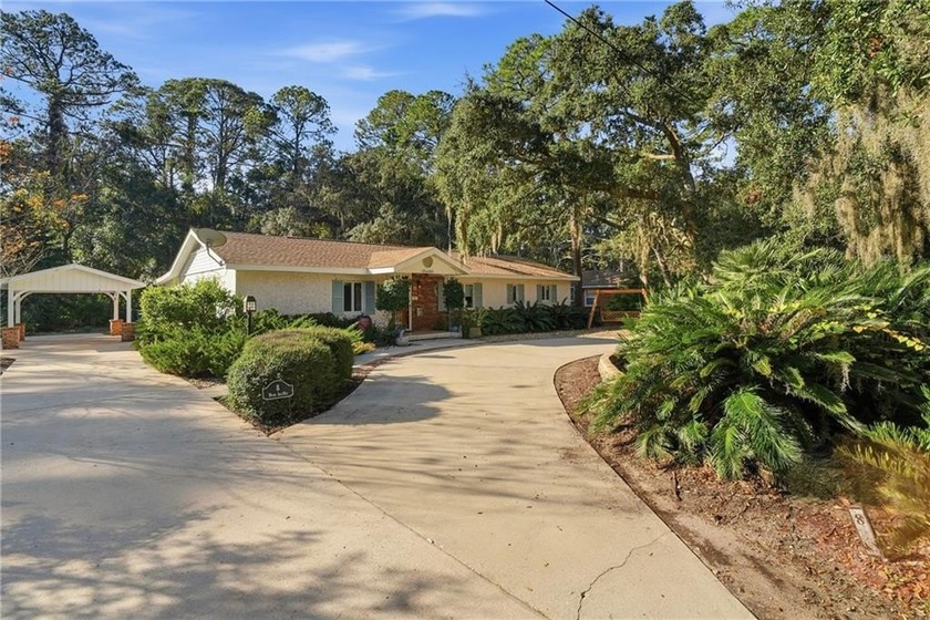 Nestled among Majestic Live Oak Trees, this charming Mid-Century - Beach Home for sale in Jekyll Island, Georgia on Beachhouse.com