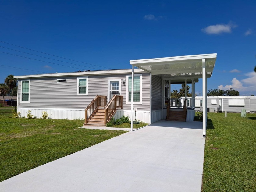 JUST REDUCED. Brand new construction, just completed on this NEW - Beach Home for sale in North Port, Florida on Beachhouse.com