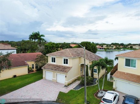 Experience serene living in this charming two-story detached - Beach Home for sale in Miramar, Florida on Beachhouse.com