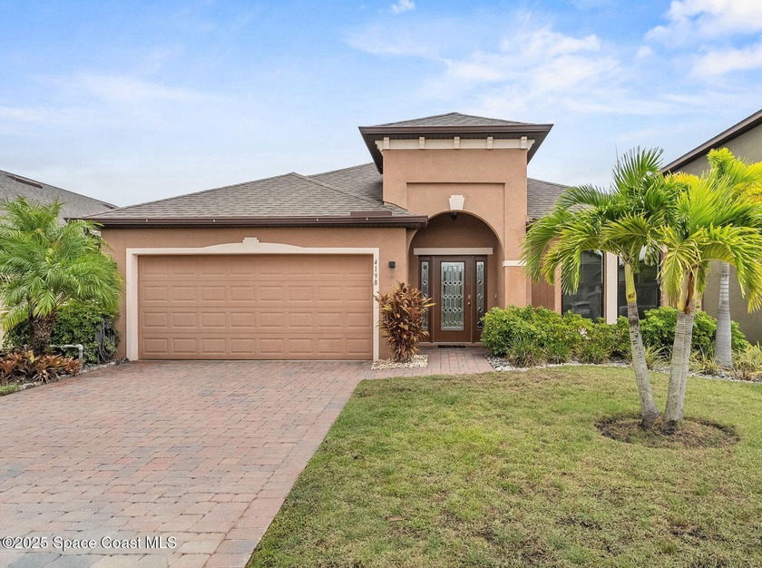 5.25% Assumable VA Loan! This stunning 4-bedroom, 3-bath home - Beach Home for sale in West Melbourne, Florida on Beachhouse.com