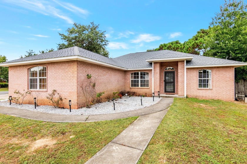 Welcome to your dream home on a stunning corner lot, nestled on - Beach Home for sale in Navarre, Florida on Beachhouse.com