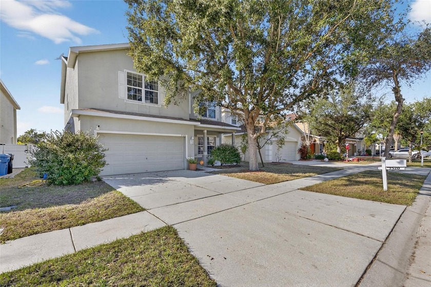 This spacious and versatile 4-bedroom, 2.5-bath home offering 2 - Beach Home for sale in Gibsonton, Florida on Beachhouse.com