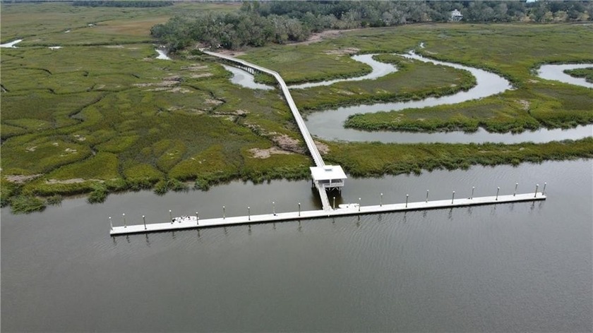 Paved roads, signage, boat storage, boat dock, 2 swimming pools - Beach Lot for sale in Townsend, Georgia on Beachhouse.com