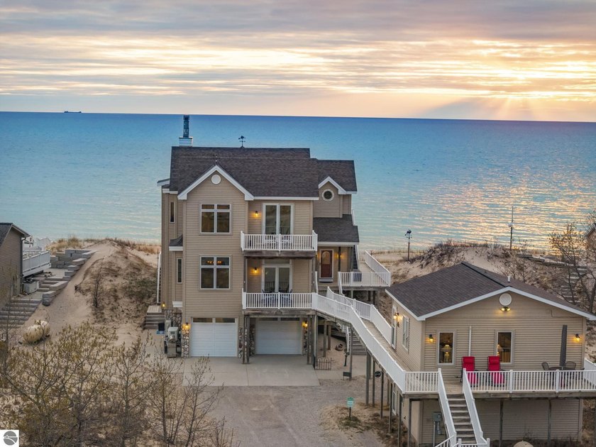 Set along 100 feet of pristine, sugar-sand shoreline on Lake - Beach Home for sale in Northport, Michigan on Beachhouse.com