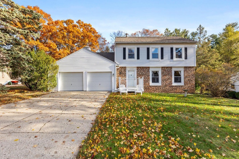 Well-maintained 5-bed, 2.5-bath home located on a quiet - Beach Home for sale in Spring Lake, Michigan on Beachhouse.com