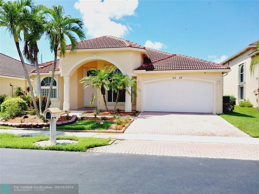 Beautiful 4-bedroom, 2-bathroom home in the very desirable gated - Beach Home for sale in Coral Springs, Florida on Beachhouse.com