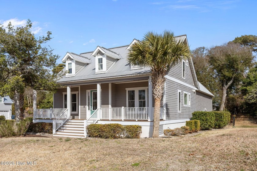 This absolutely breathtaking coastal home and deeded boat slip - Beach Home for sale in Emerald Isle, North Carolina on Beachhouse.com