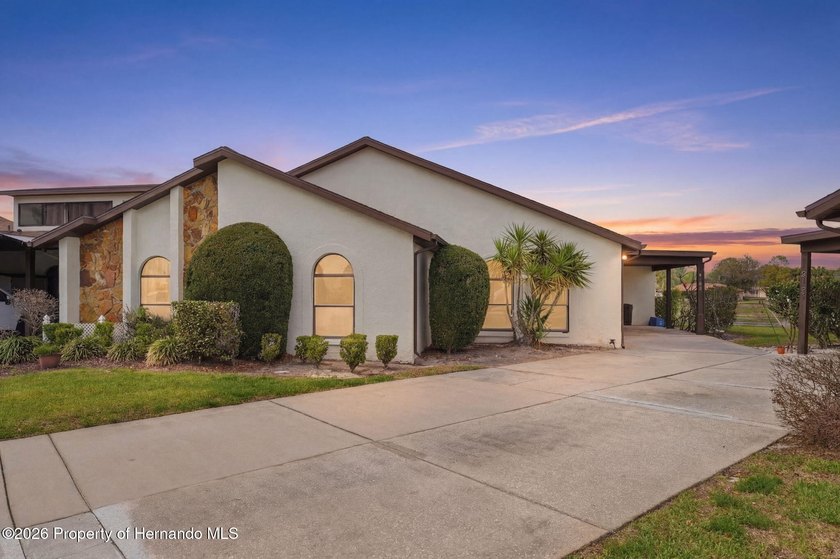 This charming bungalow-style villa is just as beautiful inside - Beach Home for sale in Weeki Wachee, Florida on Beachhouse.com